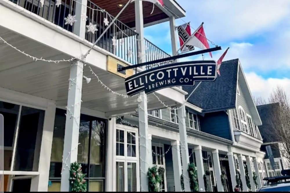 Exterior of Ellicottville Brewing Co. with festive decorations.