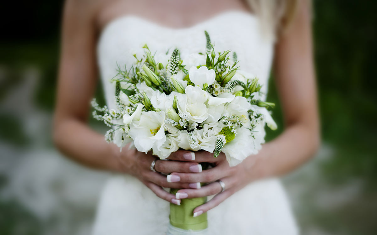 Elope in Upstate New York - Bride with Flowers